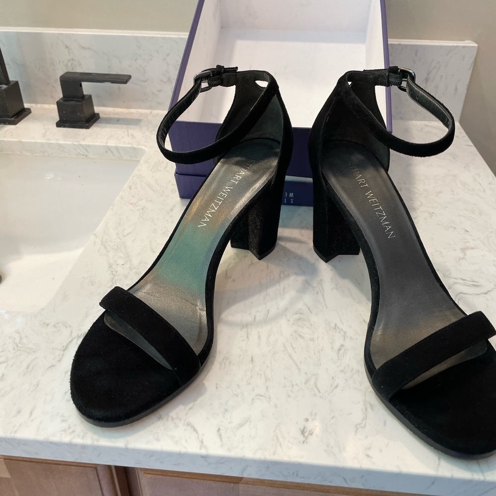 Stuart Weitzman black suede sandals.